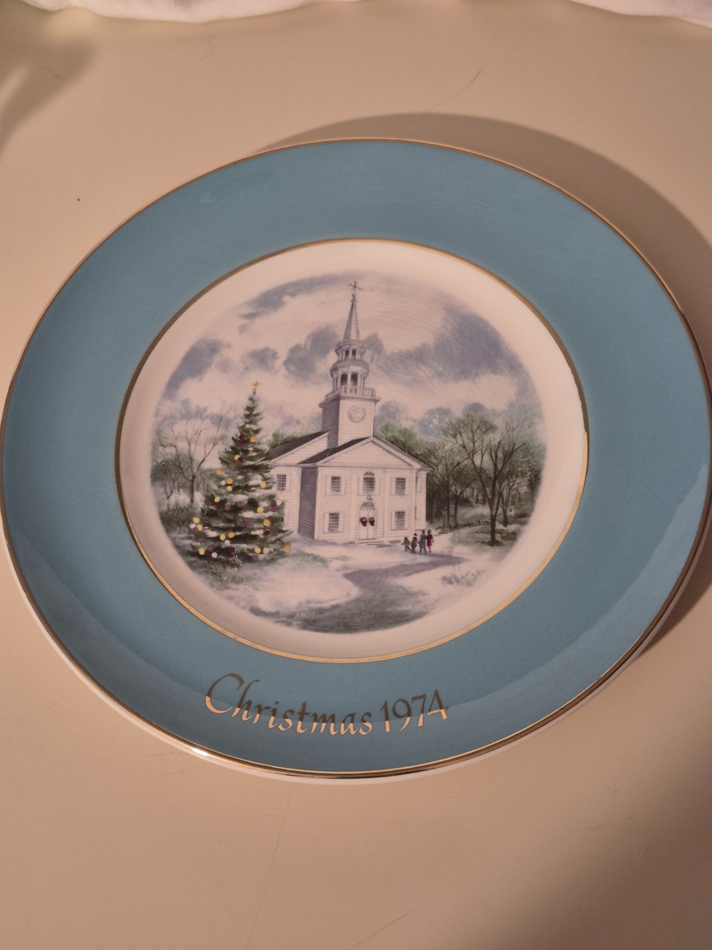Avon Christmas 1974 Decorative Plate in Light Blue with Gold Trim Second Edition